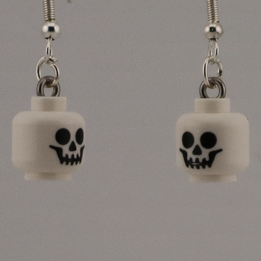 HANGING HEADS EARRINGS